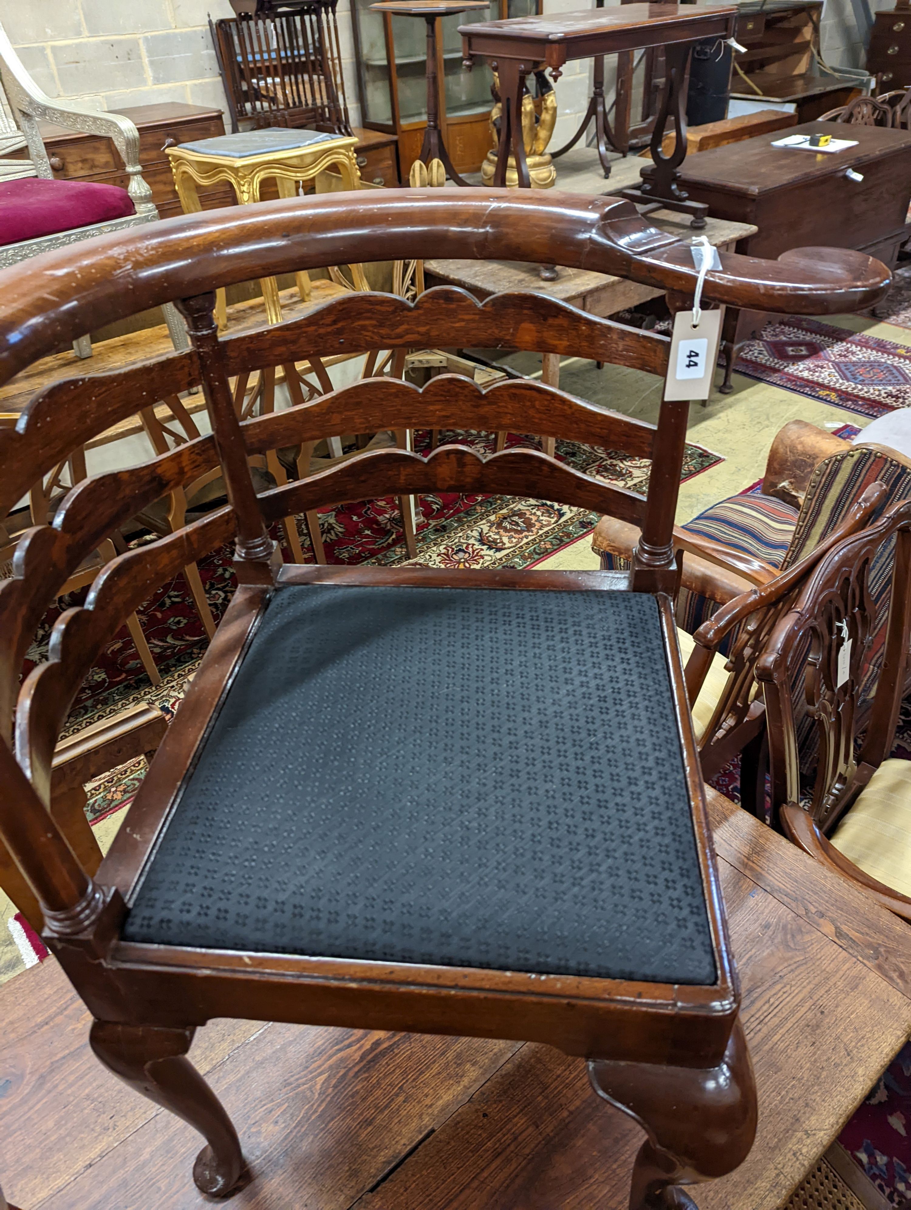 A Georgian style mahogany pad foot corner chair. H-80cm.